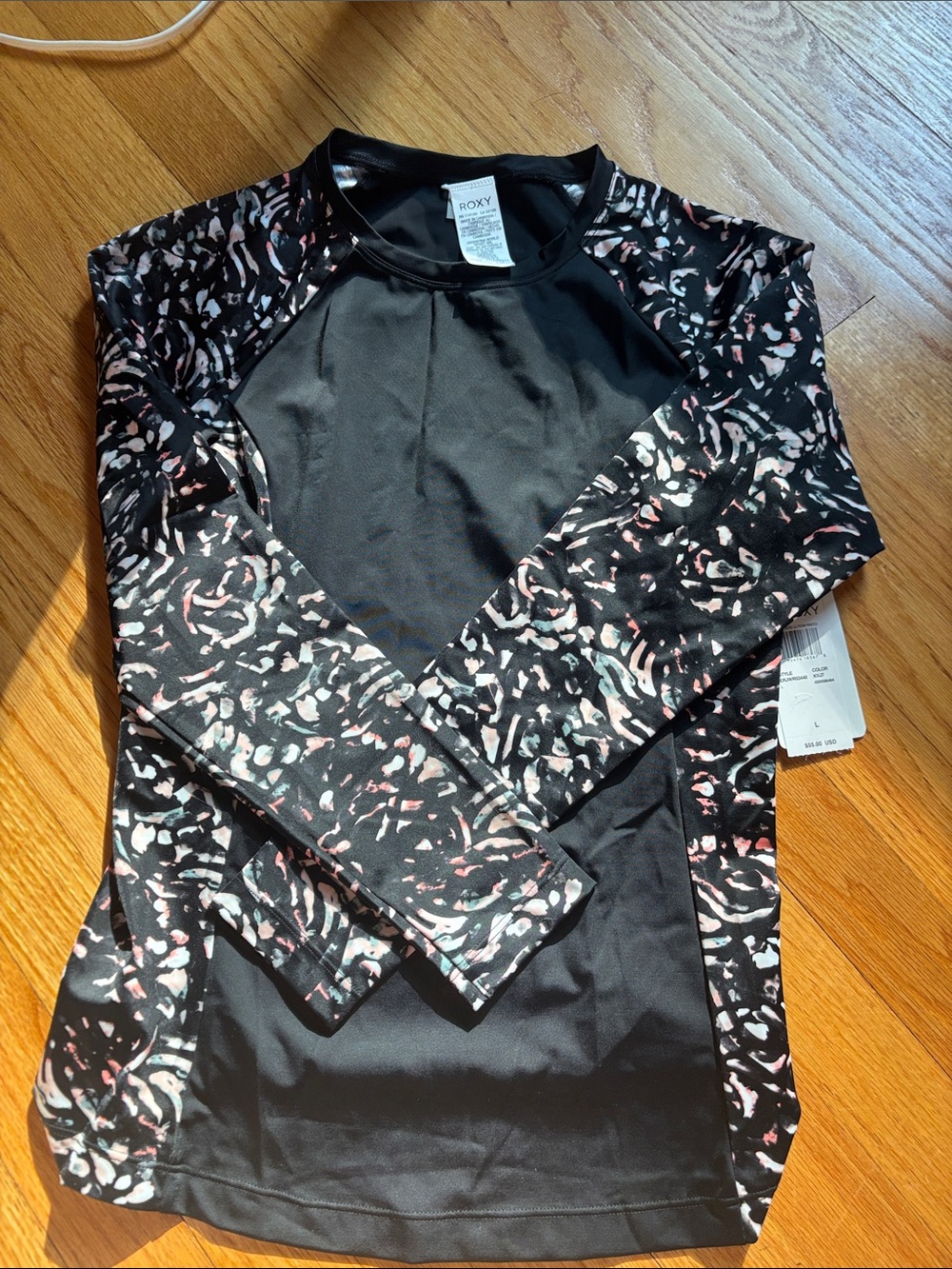 Roxy Black Rash Guard with Pink and White Abstract Sleeve Print